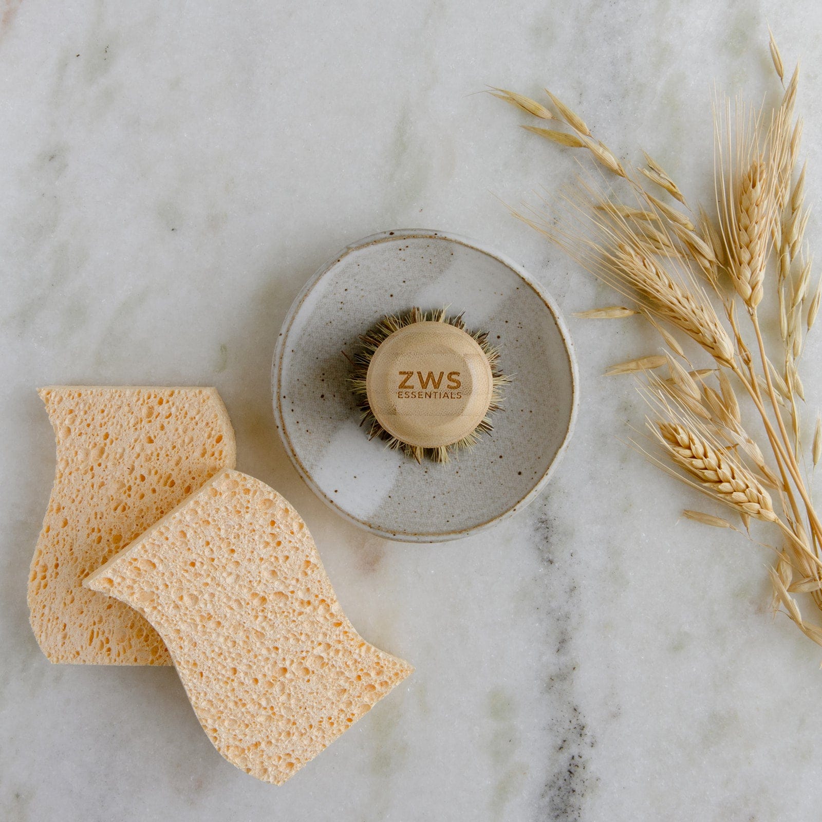 Eco-friendly bamboo pot scrubber from ZeroWasteStore, plastic-free and compostable household cleaning brush for kitchen use.