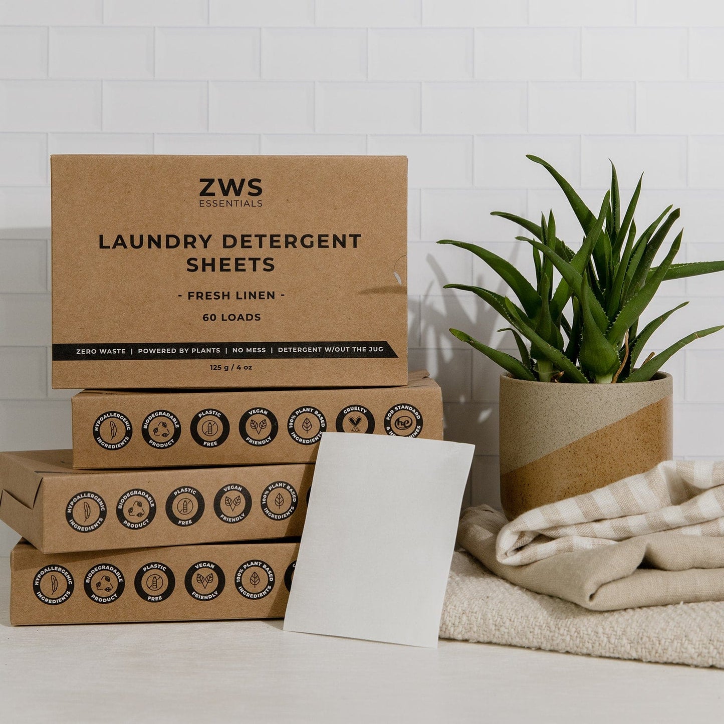 Mini kit of ZeroWasteStore.com laundry detergent with 2 boxes of fresh linen scent, eco-friendly laundry detergent for sustainable washing.