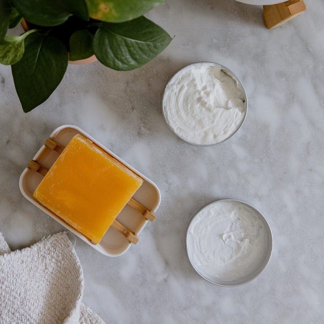 Zero Waste Store 4oz deep nourishing body butter and shampoo bar with citrus scent, natural moisturizer and zero waste skincare.