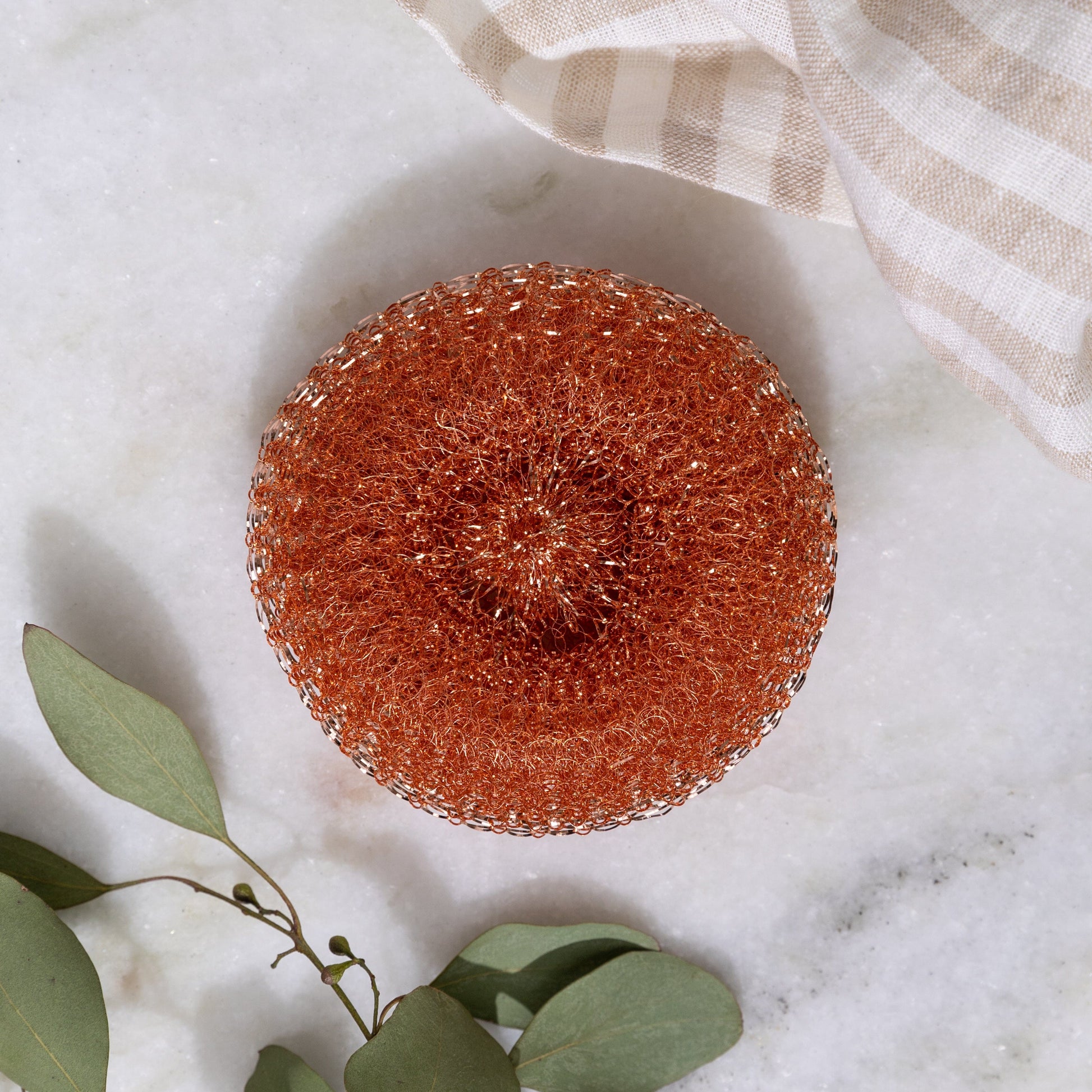 Copper scrubber pack of scrub brushes from ZeroWasteStore.com, ideal for cleaning and eco-friendly kitchen scrubbing.