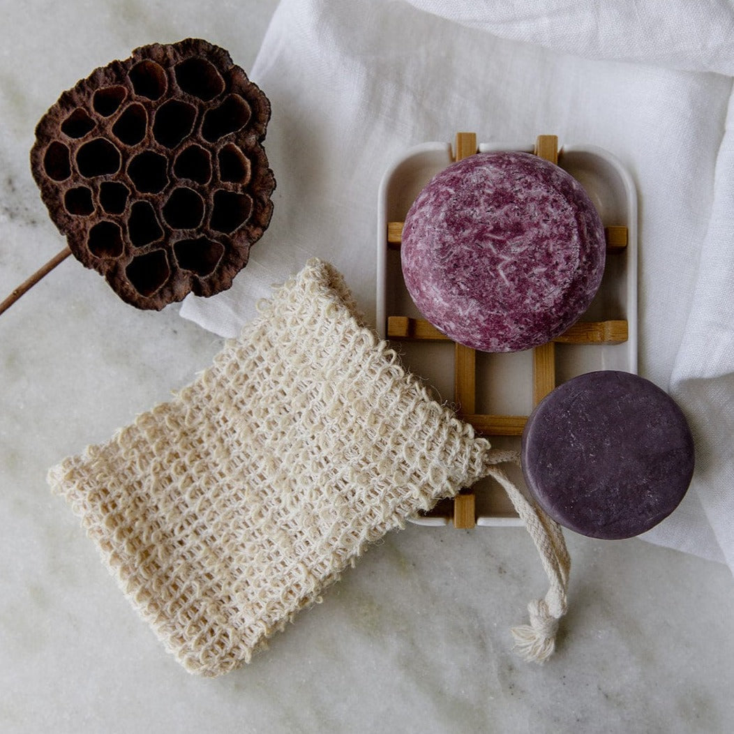 Zero Waste Hair Care Mini Kit with shampoo, conditioner, and soap dish from ZeroWasteStore.com, eco-friendly hair care set.