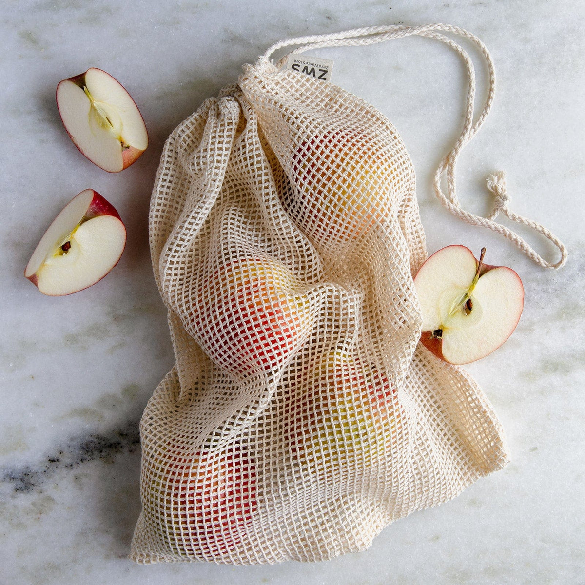 Medium natural mesh produce bag from ZeroWasteStore.com, reusable shopping tote for fruits and vegetables, eco-friendly zero waste net bag.