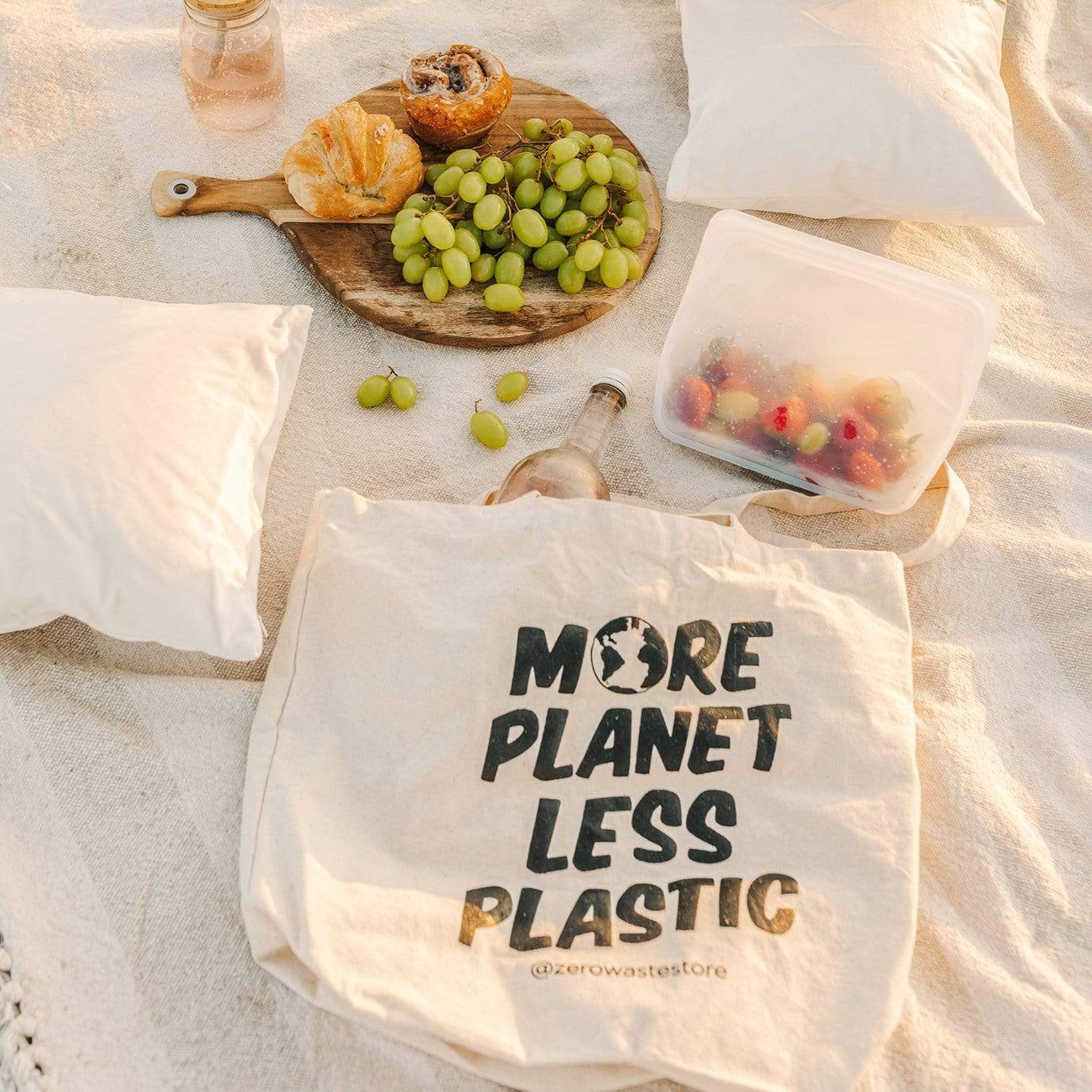 Organic tote bag from ZeroWasteStore.com featuring eco-friendly "More Planet Less Plastic" design, perfect for shopping and daily use.
