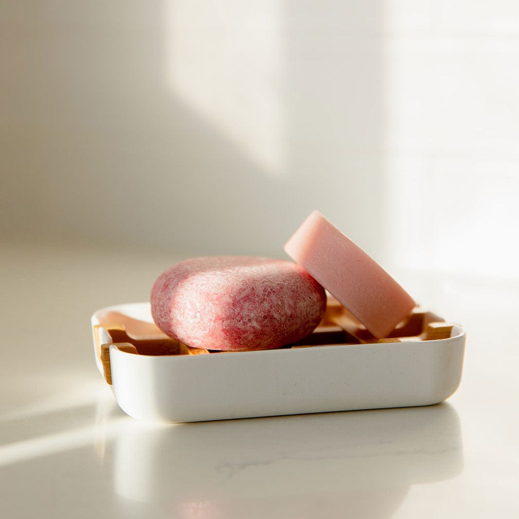 White bamboo soap dish from ZeroWasteStore.com, eco-friendly soap holder with slotted design for drainage.