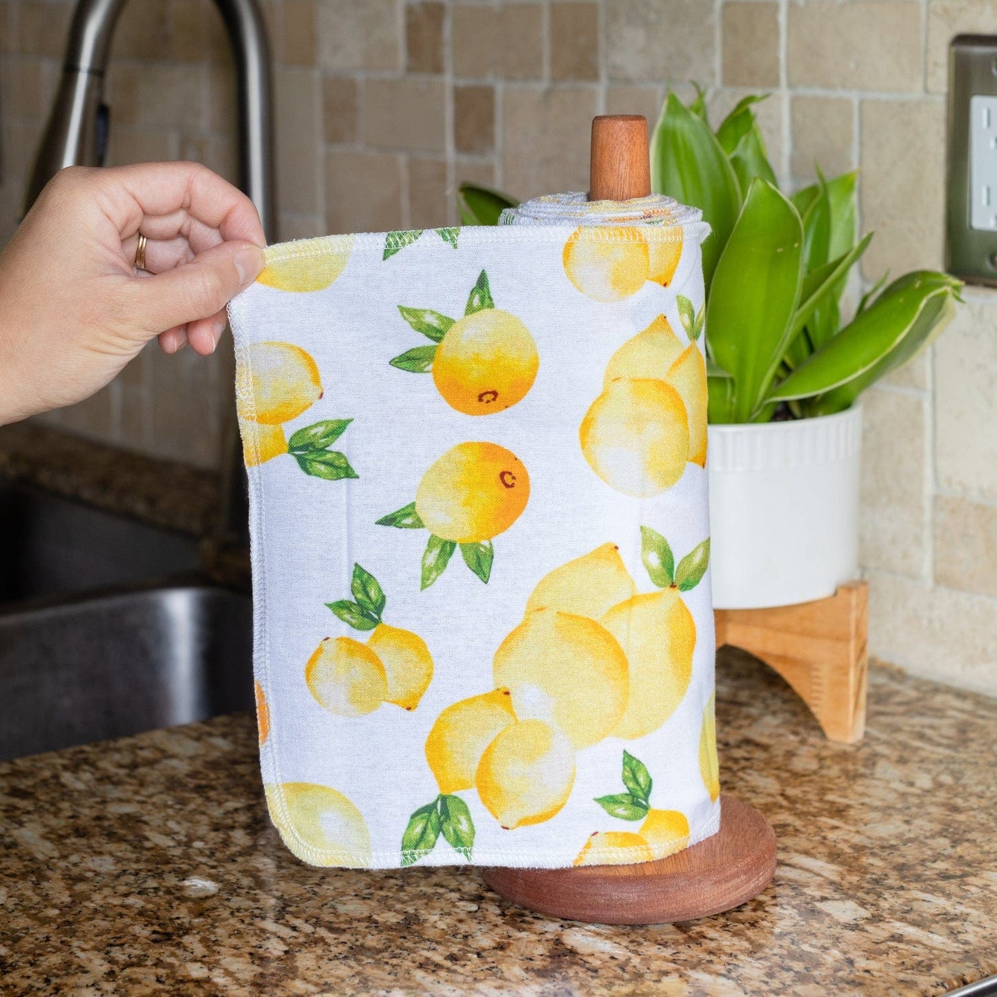 Reusable paper towels from ZeroWasteStore.com, eco-friendly cloth towels with a colorful pattern, suitable for cleaning and wiping surfaces.